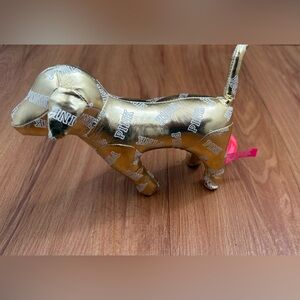 **Pre- Owned in excellent condition **
PINK Victoria's Secret Metallic Gold Dog